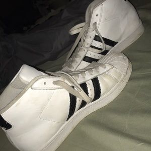 High top Adidas Superstars!!